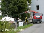 Kamenný kříž před kostelem sv. Jiří po r. 2011